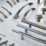 Photograph,Of,Cupboard,Door,Handles,In,A,Kitchen,Showroom.