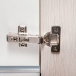 Detail,Of,Concealed,Hinge,On,Cabinet,Door,,Furniture,Fitting,Hardware