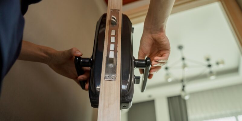 A,Technician,Installs,A,Modern,Smart,Door,Lock,On,The