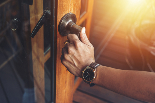 Man,Hands,Open,The,Wood,Door.